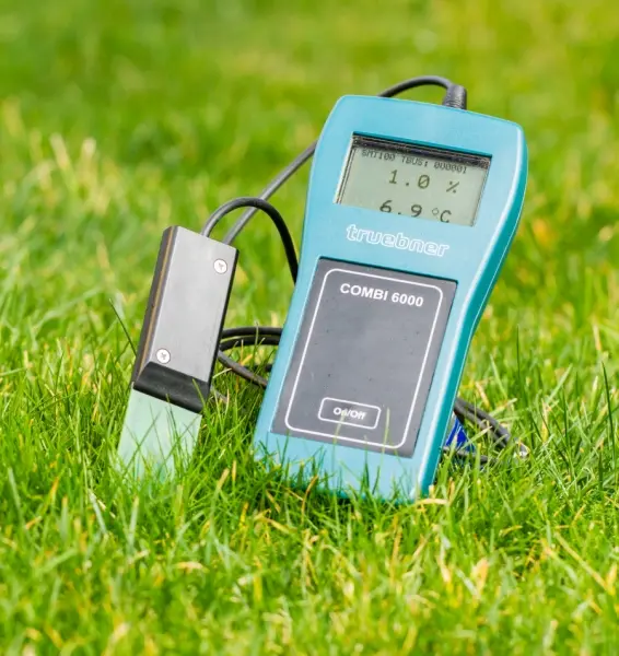 Combi-6000 Hand-held meter in use with SMT-100 for soil moisture measurement